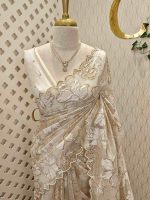 Organza with golden,off white turkish work and scallop border