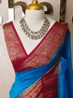 Soft silk with a plain body and traditional floral zari woven contrast border - Image 8