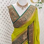 Soft silk with a plain body and traditional floral zari woven contrast border