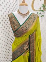 Soft silk with a plain body and traditional floral zari woven contrast border