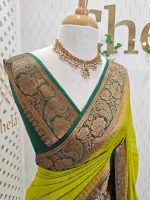 Soft silk with a plain body and traditional floral zari woven contrast border - Image 2