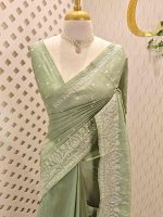 Semi tussar with paisley and floral embroidery along the border and embroidered buttas across the body