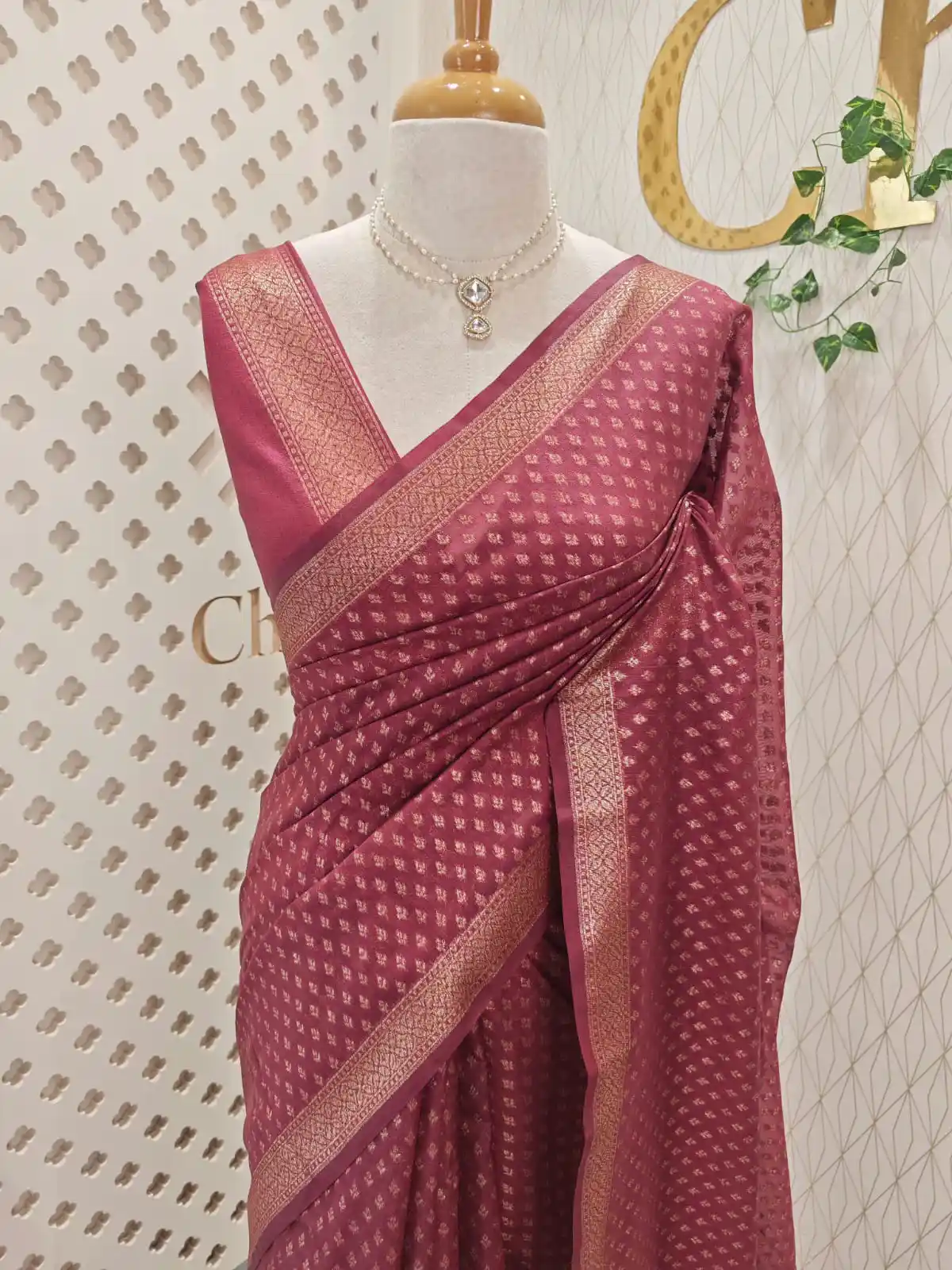 Tissue Banarasi with small floral buttas across the body and floral zari-woven border