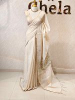 Tissue silk with thick floral applique embroidery on the pallu and minimal floral motifs allover the body. - Image 12