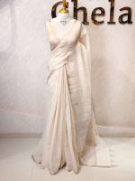 Tissue silk with thick floral applique embroidery on the pallu and minimal floral motifs allover the body. - Image 6