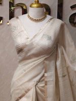 Tissue silk with floral,leaf like applique on the pallu