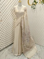 Tissue silk with floral vien like applique-embroidery on the pallu and minimal floral motifs allover the body. - Image 12