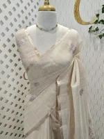 Tissue silk with floral vien like applique-embroidery on the pallu and minimal floral motifs allover the body. - Image 10