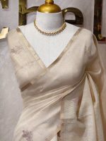 Tissue silk with floral vien like applique-embroidery on the pallu and minimal floral motifs allover the body. - Image 5