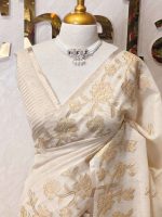 Tissue silk with floral applique embroidery on the lower bottom and pallu and minimal floral buttas allover the body - Image 2