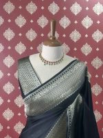 Banarasi saree with a plain body, complemented by a traditional zari-woven double border - Image 20