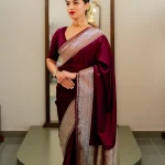 Banarasi saree with a plain body, complemented by a traditional zari-woven double border