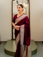Banarasi saree with a plain body, complemented by a traditional zari-woven double border