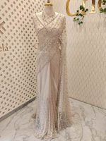 Net saree with honey comb like design and scallop border - Image 3