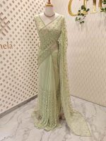 Net saree with honey comb like design and scallop border - Image 6