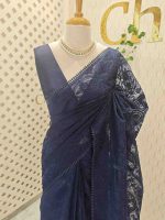 Organza saree with an allover paisley-inspired thread work pattern highlighted by intricate floral detailing - Image 15
