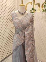 Organza saree with flame inspired turkish work and scallop border