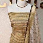 Net Kota salwar material with contrast multicolour striped patterns across the body