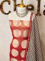 Net kota salwar material with oversized polka dot printed patterns across the body
