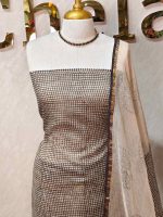 Net kota salwar material with small polka dot printed patterns all over the body and a floral bud printed border