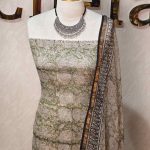 Net kota salwar material with an all-over paisley and floral patterns