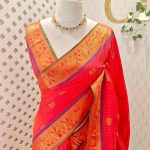 Soft silk with zari pinstripes, traditional zari-woven buttas on the body and a contrast elephant motif zari-woven border