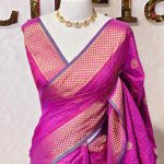 Soft silk with a checkered body, traditional zari buttas and a geometric zari-woven border