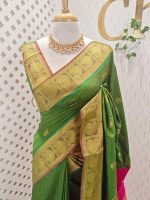 Soft silk with traditional zari woven buttas on the body and a contrast paisley zari-woven border
