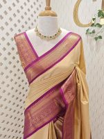 Soft silk with pinstripes and zari-woven butta on the body and a contrast traditional zari border with temple-inspired detailing