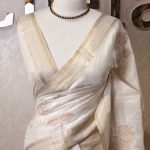 Semi Tussar with rose like floral applique-embroidery motifs all-over the body