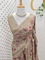 Semi Tussar with floral pattern highlighted by  running stitch embroidery and sequins work All over the body