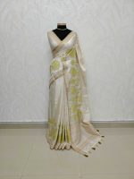 Semi Tussar with oversized floral applique embroidery on the body complimented by minimal floral buttas across the body - Image 2