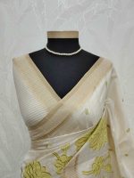 Semi Tussar with oversized floral applique embroidery on the body complimented by minimal floral buttas across the body - Image 3