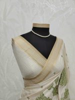 Semi Tussar with oversized floral applique embroidery on the body complimented by minimal floral buttas across the body - Image 10