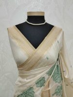Semi Tussar with oversized floral applique embroidery on the body complimented by minimal floral buttas across the body - Image 6