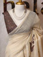 Tissue saree with oversized floral-vine inspired applique detailing on the body and a delicate crochet lace border - Image 4
