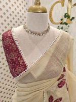 Tissue Saree with floral applique embroidery on the body complimented by a lace-detailing  border - Image 11