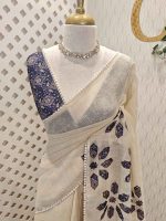 Tissue Saree with floral applique embroidery on the body complimented by a lace-detailing  border - Image 13