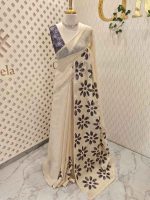 Tissue Saree with floral applique embroidery on the body complimented by a lace-detailing  border - Image 15