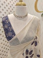 Tissue Saree with floral applique embroidery on the body complimented by a lace-detailing  border - Image 14