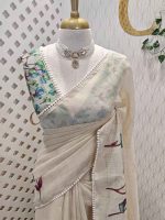 Tissue saree with orchid -inspired floral applique-embroidery on the lower body complimented by a lace-detailing  border - Image 7