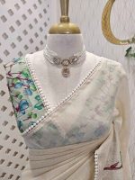 Tissue saree with orchid -inspired floral applique-embroidery on the lower body complimented by a lace-detailing  border - Image 8