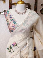 Tissue saree with orchid -inspired floral applique-embroidery on the lower body complimented by a lace-detailing  border - Image 4