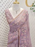Tissue with floral vine applique embroidery all over the body, highlighted with pastel floral detailing, a subtle zari border