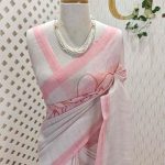 Linen saree with abstract floral -inspired print and contrast border