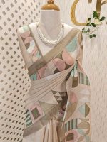 Linen saree with abstract geometric printed pallu and contrast border