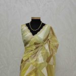 Organza with geometric zari embroidery and double scalloped border