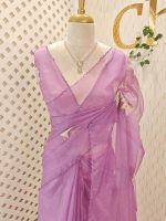 Organza saree with blooming floral embroidery and minimal lace detailing