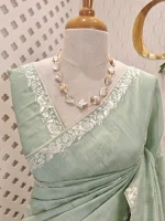 Semi Tussar Saree with floral embroidery, zari-patterned body, and minimal floral vine border - Image 11