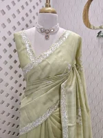 Semi Tussar Saree with floral embroidery, zari-patterned body, and minimal floral vine border - Image 4